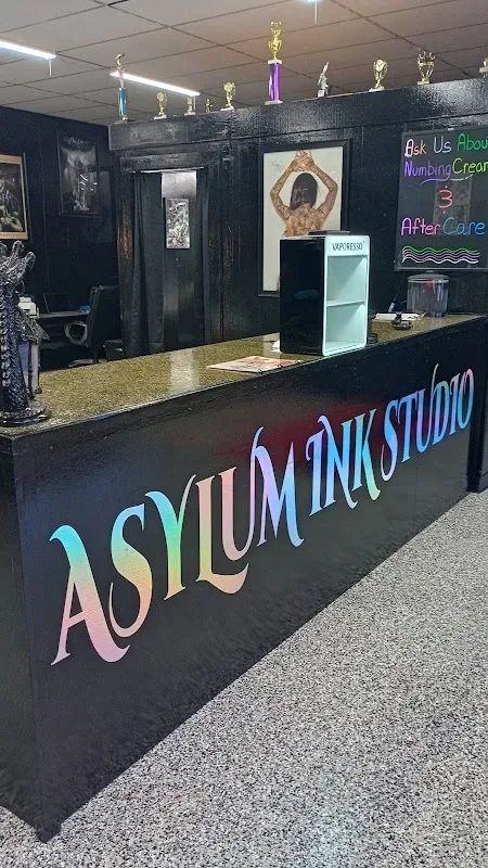 Asylum Ink Tattoo & Piercing Studio — Tattoo and piercing shop in Fayetteville